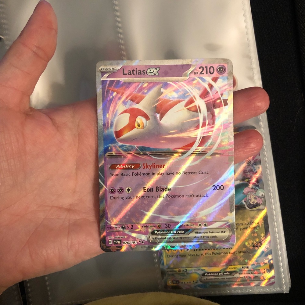 Latias ex (076/191) from the Surging Sparks